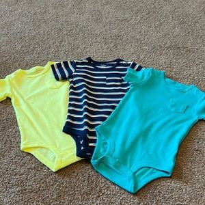 Carter’s 3 piece.  New without tag.  Bright colored onesie set.  12 month.